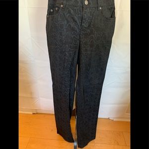 Jones New York pants. Size 6. Black and blue animal print pattern. Stretch